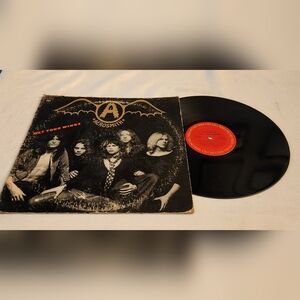 Vintage 1974 Vinyl LP Record Album by Aerosmith titled Get Your Wings PC 32847